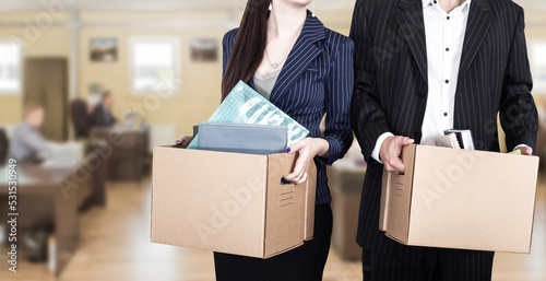 Man and woman are fired. Of...