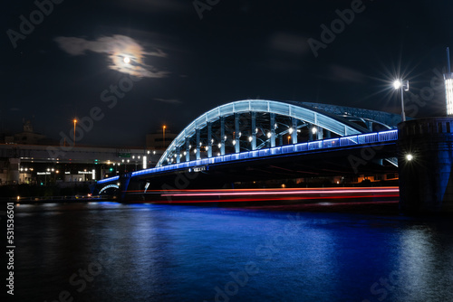 ライトアップされた隅田川駒形橋と月と都市夜景 © masahiro