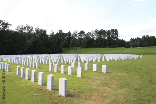 National Cemetery, with markers, head stones , and flags