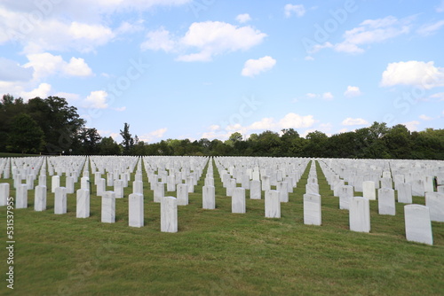 National Cemetery, with markers, head stones , and flags