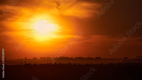 Evening sky with setting sun through clouds at sunset, cloudy landscape © Андрей Журавлев