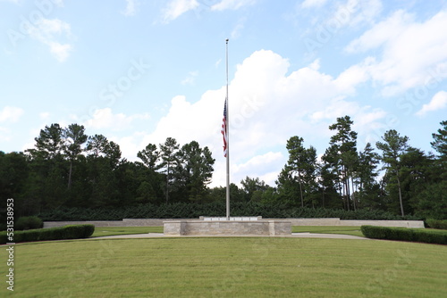 National Cemetery, with markers, head stones , and flags