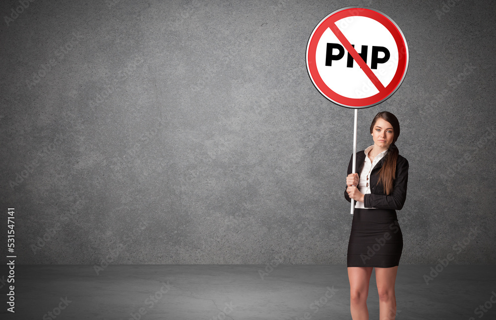 Young business person holdig traffic sign Young business person holdig traffic sign