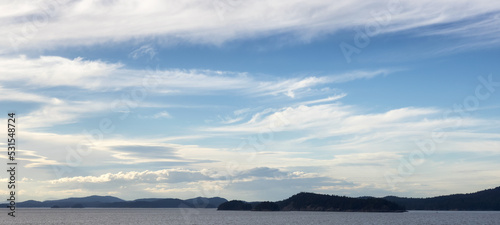 Cloudy Cloudscape during sunny summer Day on the West Coast