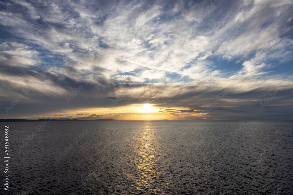 Cloudy Cloudscape during sunny summer Day on the West Coast of Pacific Ocean