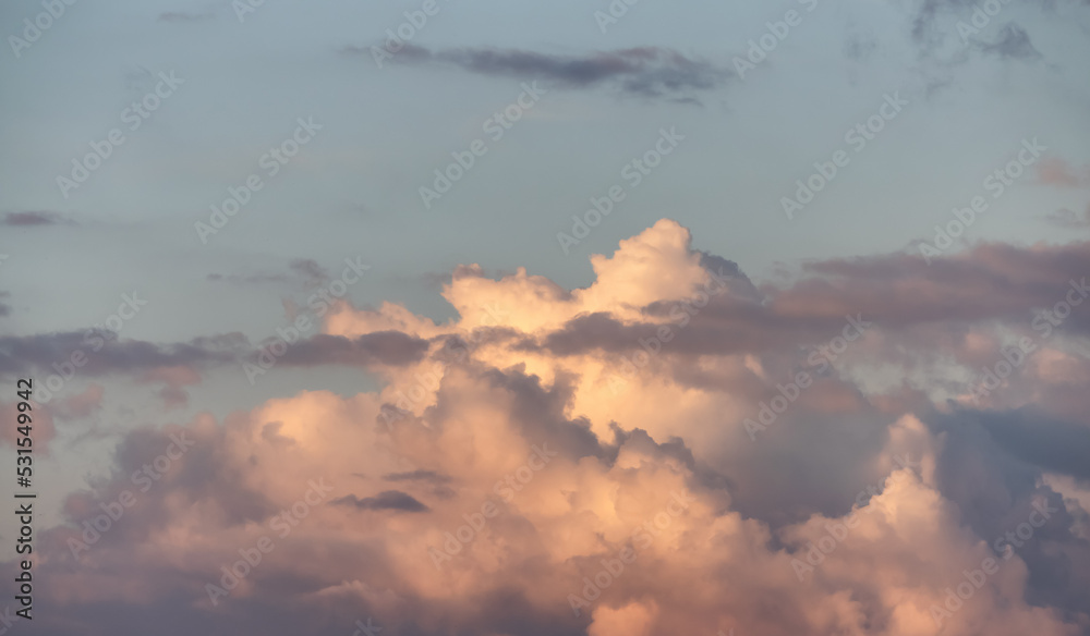 Puff Clouds in the Sky during sunset. Zoom in. Cloudscape Background. Puff Clouds in the Sky during sunset. Zoom in. Cloudscape Background.