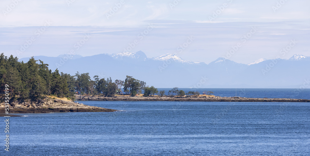 Canadian Landscape by the ocean and mountains. Summer Season.