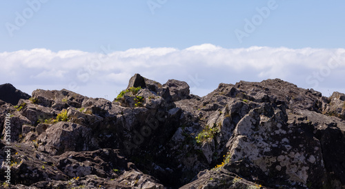 Rugged Rocks on a rocky shore on the West Coast of Pacific Ocean. © edb3_16