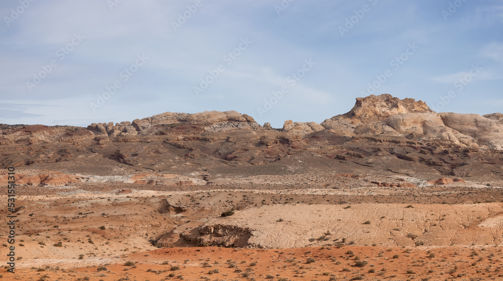 Red Rock Formations and Hoodoos in the Desert at Sunrise.