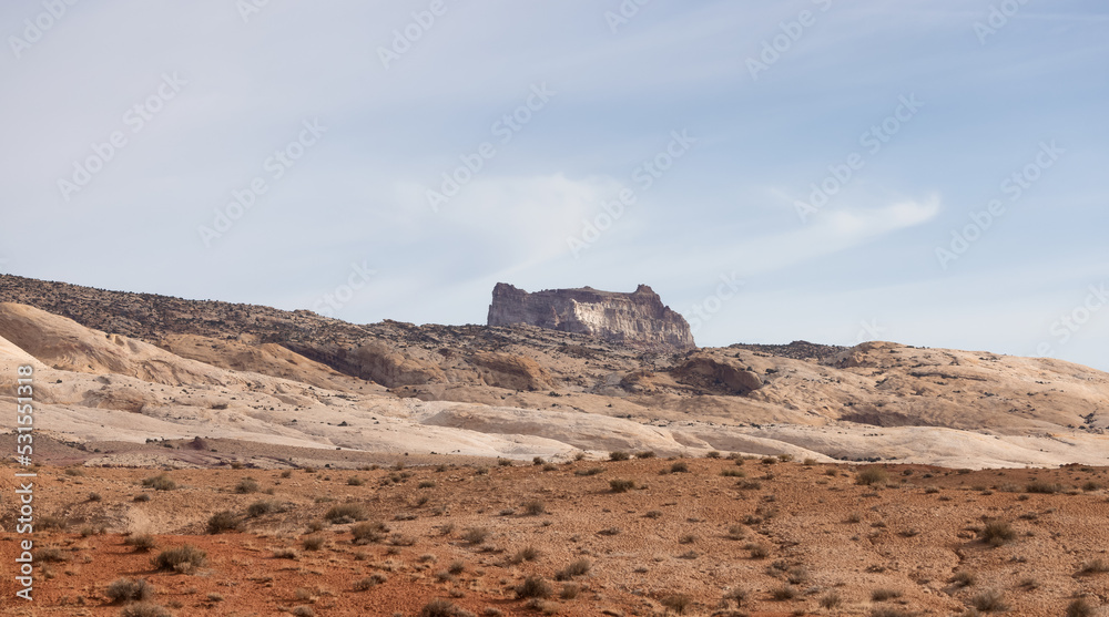 Red Rock Formations and Hoodoos in the Desert at Sunrise.