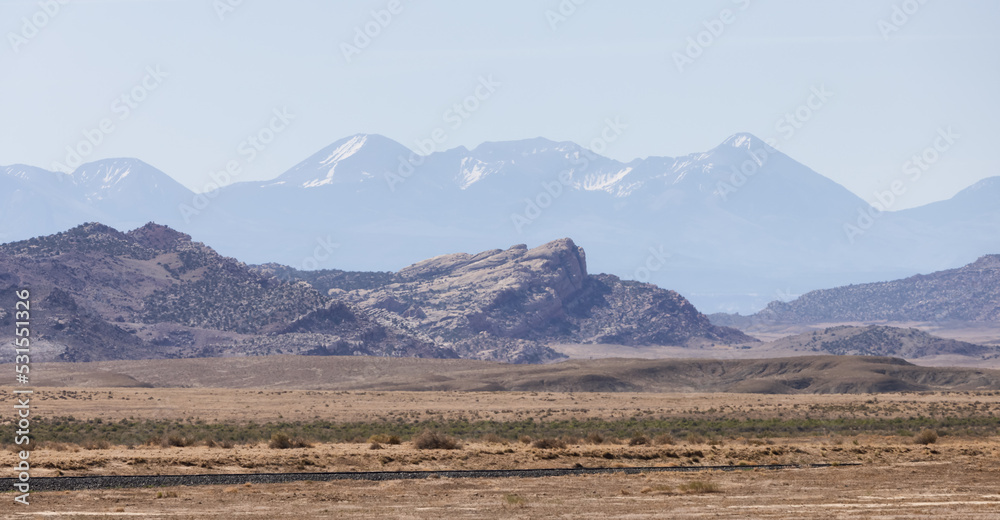 Fototapeta premium Red Rock Formations in the American Landscape Desert at Sunrise.