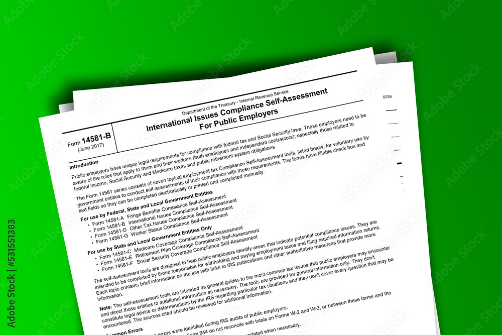 Form 14581-B documentation published IRS USA 09.16.2017. American tax document on colored Form 14581-B documentation published IRS USA 09.16.2017. American tax document on colored