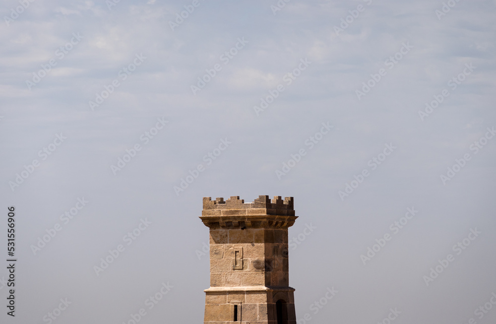 View of a single tower in a medieval castle in Barcelona