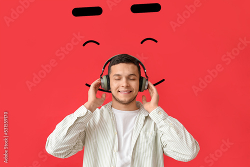 Young man with headphones a...