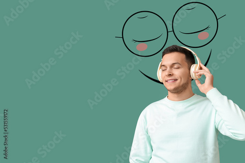 Young man with headphones a...
