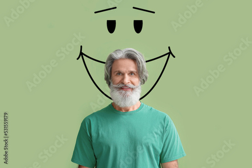 Bearded senior man and draw...