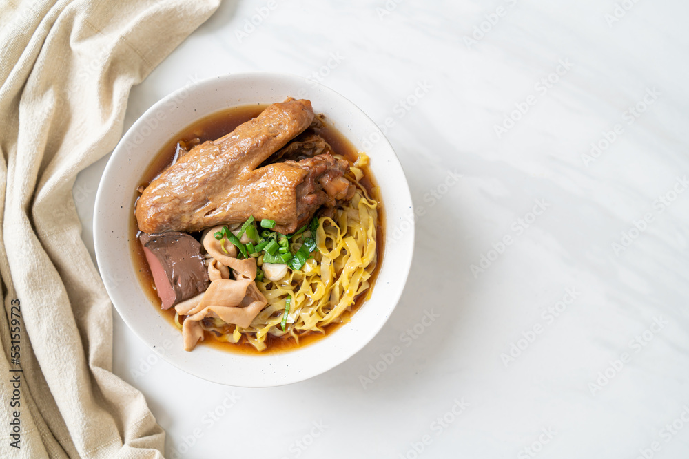 egg noodles with stewed and braised duck in brown soup egg noodles with stewed and braised duck in brown soup