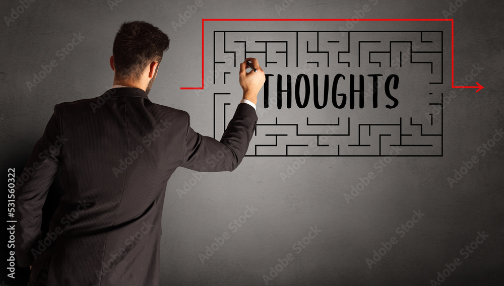businessman drawing maze concept businessman drawing maze concept
