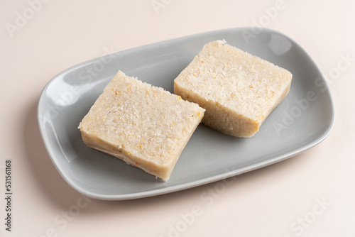 Raw Turnip cake (Chinese : Chai tow kway ). Turnip cake is a common dish or dim sum of Teochew cuisine in Chaoshan, China usually cut into rectangular slices and sometimes pan-fried before serving.