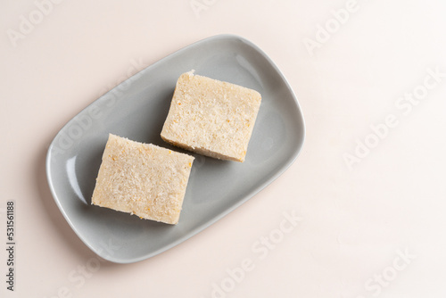 Raw Turnip cake (Chinese : Chai tow kway ). Turnip cake  is a common dish or dim sum of Teochew cuisine in Chaoshan, China usually cut into rectangular slices and sometimes pan-fried before serving.