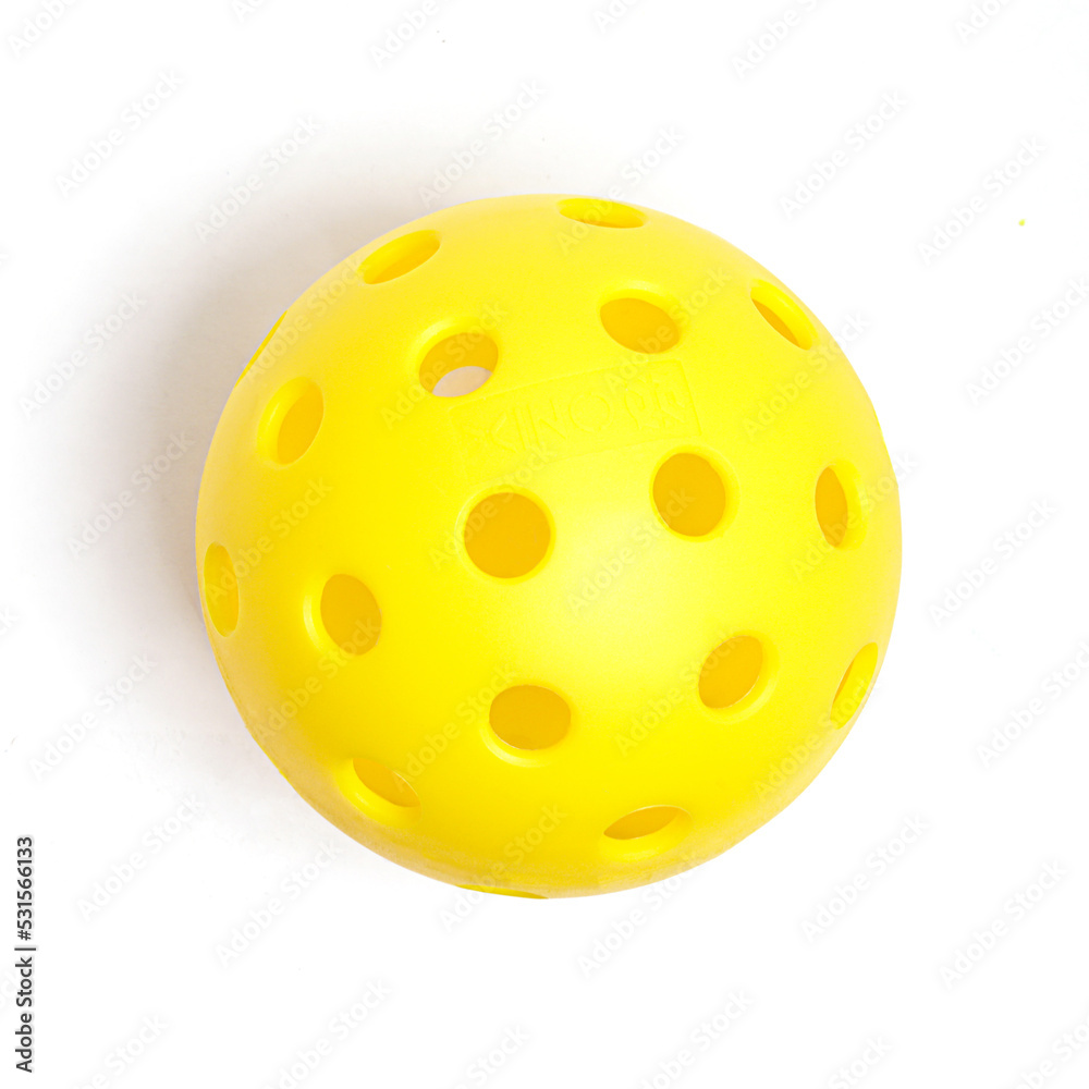 custom made wallpaper toronto digitalYellow Pickleball ball isolated on white background.
