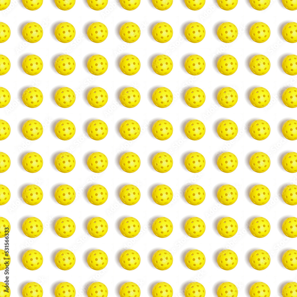 Pickleball repeat pattern with yellow Pickleball and white background. Pickleball repeat pattern with yellow Pickleball and white background.