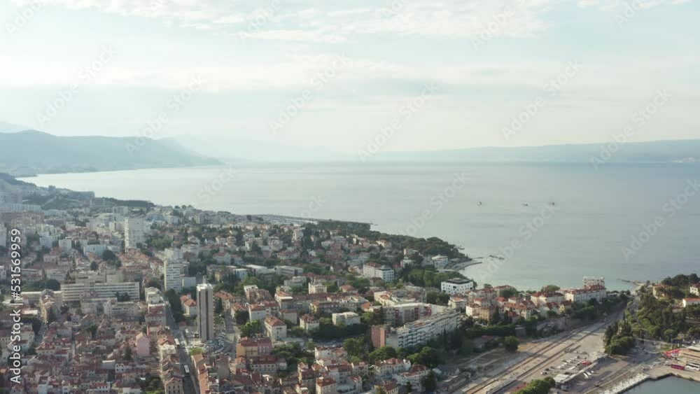 Aerial view Split Croatia. Cityscape with a promenade and a beautiful city on the seashore. Port with ships, historical houses, mountain landscape. High quality 4k footage Aerial view Split Croatia. Cityscape with a promenade and a beautiful city on the seashore. Port with ships, historical houses, mountain landscape. High quality 4k footage