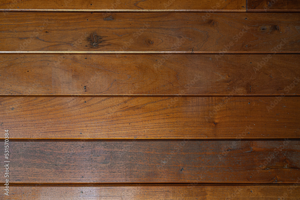 Naklejka premium Plank wood table floor with natural pattern texture background.