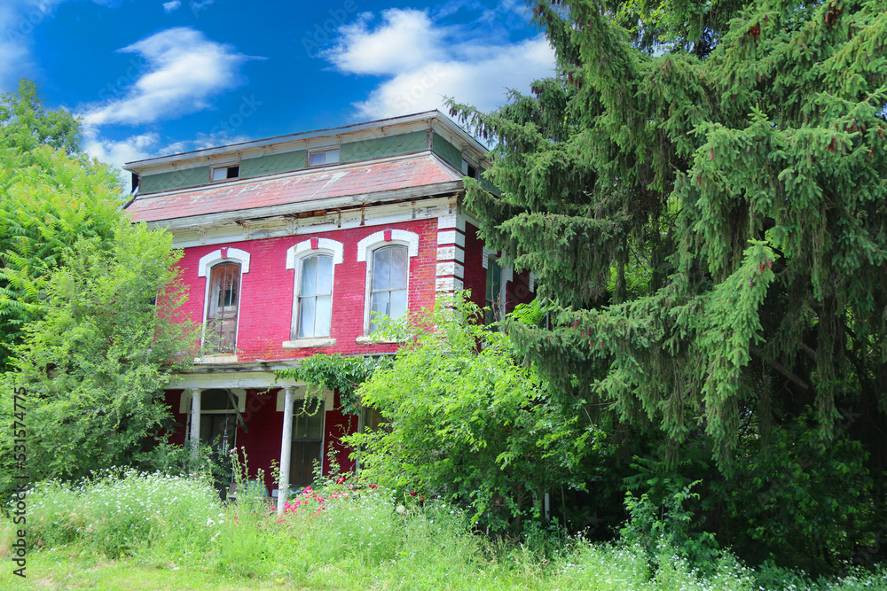 rural abandoned closed empty house home farmhouse farm building overgrown trees yard rural abandoned closed empty house home farmhouse farm building overgrown trees yard