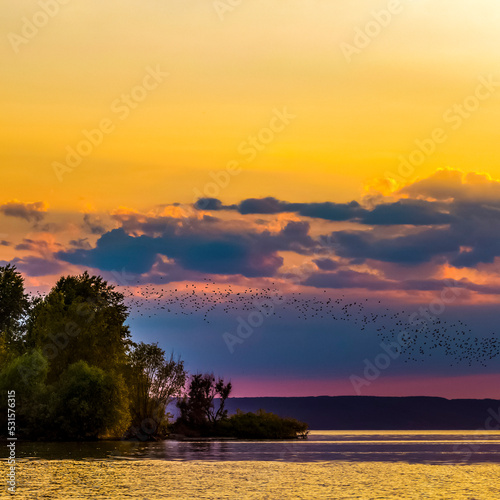 Beautiful landscape of the evening sunset on the lake