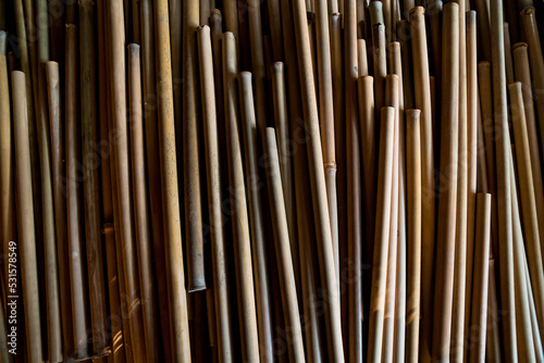 A very large pile of small bamboo, which will later be made into various crafts such as children's toys, straws, flutes, and others, the production process is done manually by local craftsmen