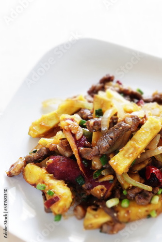 Chinese food, sweet potato and beef stir fried for winter vegetable comfort food