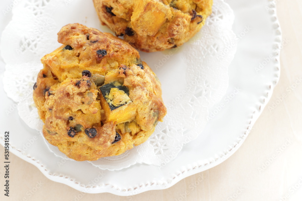 Fototapeta premium Homemade pumpkin scone for autumn breakfast food image