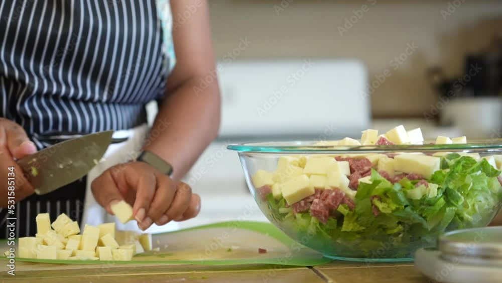 Adding provolone cheese to a chopped salad - ANTIPASTO SALAD SERIES Adding provolone cheese to a chopped salad - ANTIPASTO SALAD SERIES