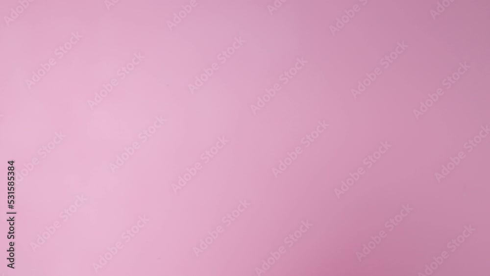 New years eve celebration pink background with champagne glasses