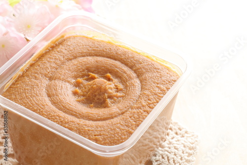 Japanese food ingredient, miso in plastic container for seasoning  photo