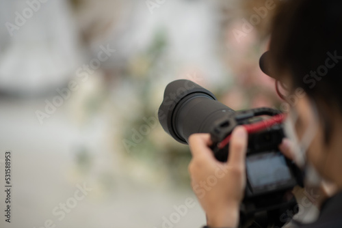 videographer close up, cameraman, man with camera, movie,