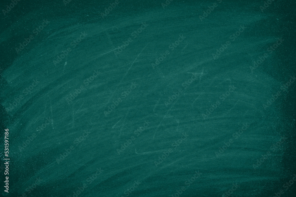 © pattanawit - Green Chalkboard. Chalk texture school board display for background. chalk traces erased with copy space for add text or graphic design. Backdrop of Education concepts