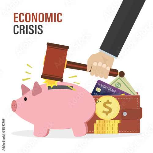 Big and uses hammer and breaks the piggy bank. Financial and economic crisis is destroying savings. Rainy day, spending money in times of trouble and crisis.