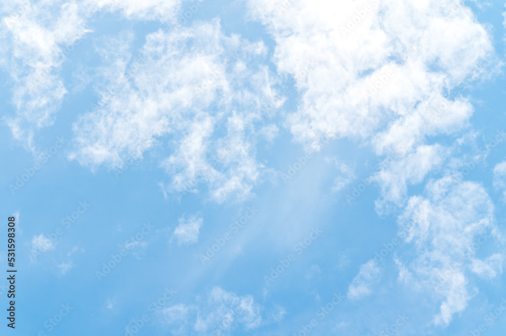 Beautiful white fluffy clouds in blue sky. Nature background from white clouds in sunny day Beautiful white fluffy clouds in blue sky. Nature background from white clouds in sunny day
