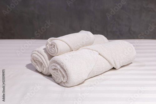 Fototapeta Naklejka Na Ścianę i Meble -  stack of white towel on bedroom