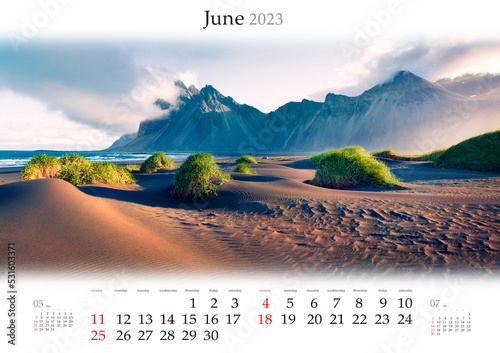 Wall calendar for 2023 year. June, B3 size. Set of calendars with amazing landscapes. Nice summer scene of green dunes on Stokksnes cape with Vestrahorn mountain. Monthly calendar ready for print..