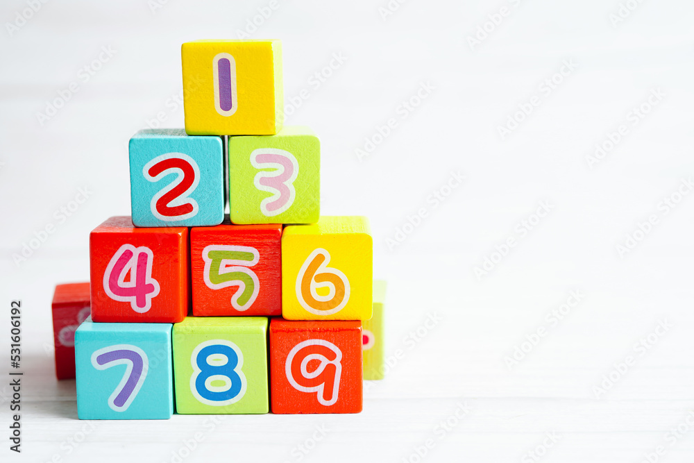 Number wood block cubes for learning Mathematic, education math concept. Number wood block cubes for learning Mathematic, education math concept.