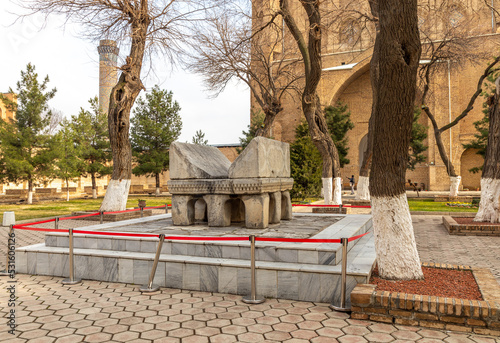 The Koran on the territory of the Bibi Khanum cathedral mosque. Samarkand city, Uzbekistan.