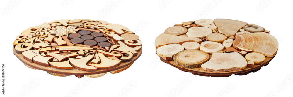 Fototapeta premium A set of two isolates on a transparent background. Wooden stands for hot dishes, glued from tree saws.