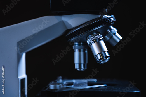 professional scientific equipment microscope for medicine scientist using in biotechnology science laboratory, biology or chemistry and medical technology research with microbiology experiment