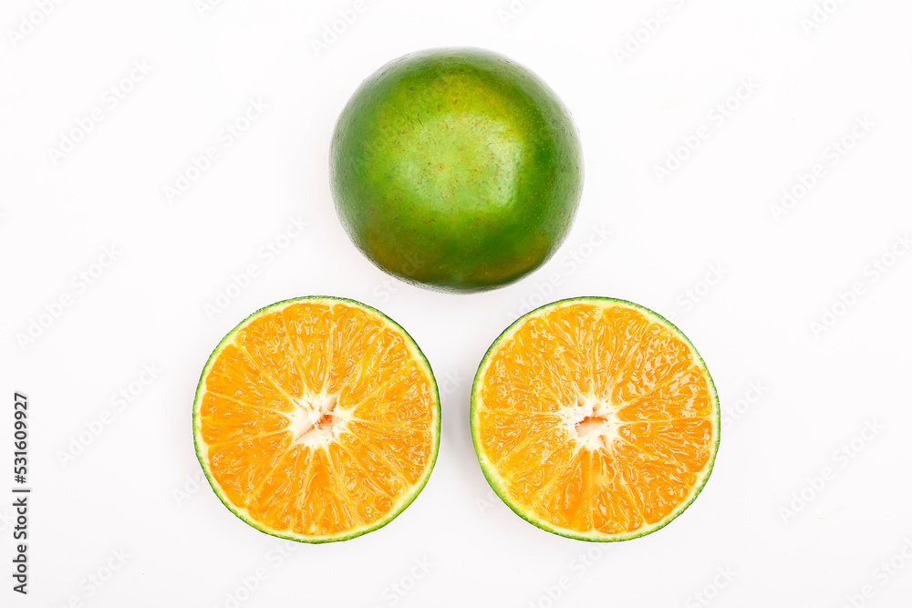 fresh orange fruits and slices isolated on a white background fresh orange fruits and slices isolated on a white background