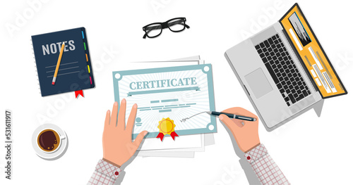 Businessman hand signs certificate
