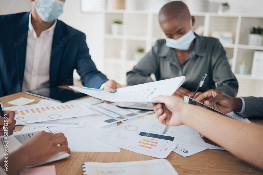 Accounting, audit and meeting team during covid with face mask. Strategy, planning and business men and black woman with data and documents. Financial advisor and accountant with growth report. Accounting, audit and meeting team during covid with face mask. Strategy, planning and business men and black woman with data and documents. Financial advisor and accountant with growth report.