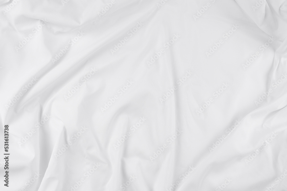 White fabric. luxurious white fabric texture background. Creases of satin, silk, and cotton.